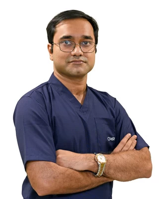 Dr. Manish De
